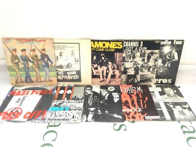 Ten punk 7" singles by various artists including Dead Kennedys, The Damned, Ramones and others.