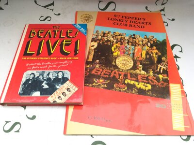 A Beatles Live! hardback book by Mark Lewisohn complete with flexi disc plus a souvenir Beatles poster book (2).