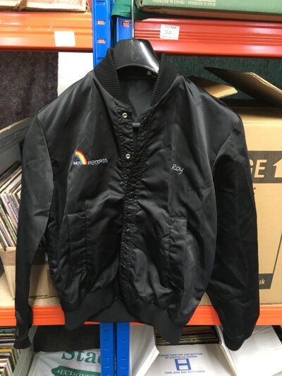 An MCA records bomber jacket. Size S.