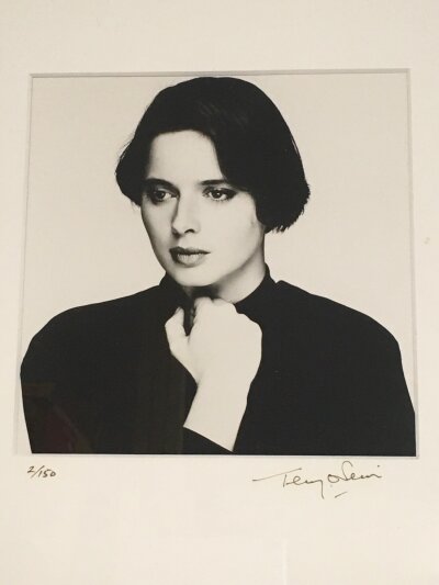 Terry O'Neill CBE 1938-2019. A framed and glazed limited edition gelatin silver print of Isabella Rossellini signed and numbered by Terry O'Neill to the mount, 2/150. Approx size including frame 38cm x 46cm.