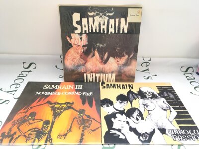 Three Samhain LPs comprising a red vinyl Initium, November Coming Fire and Unholy Passion.