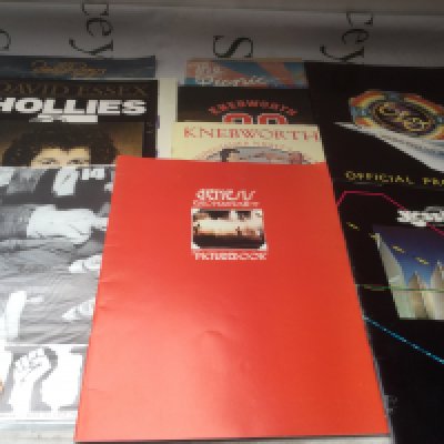 A collection of music programs, most with tickets, for shows by various artists including Genesis, ELO, Yes and others plus various ephemera.