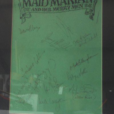 A framed and glazed Maid Marian & Her Merry Men headed paper signed by the cast.