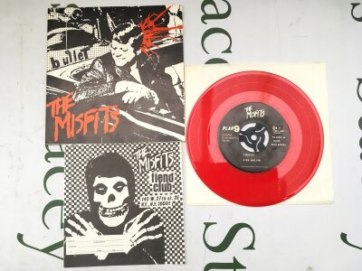 A second US pressing of The Misfits - Bullet EP on red vinyl complete with Fiend Club insert. Signatures on reverse of cover. EX/EX.