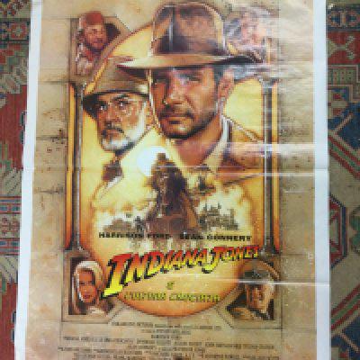 An Italian film poster for Indiana Jones and The Last Crusade, rolled. Approx 140cm x 100cm.