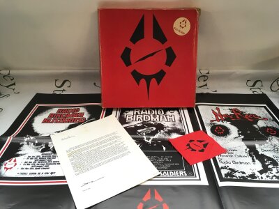 A Radio Birdman multi LP/EP/7" box set with inserts. Box damaged.