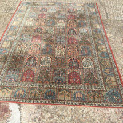 A modern rug in Persian garden pattern, approx 304cm x 200cm. Shipping category D.