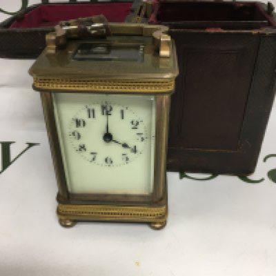 A brass carriage clock the dial with Arabic numerals fitted in original case . NO RESERVE