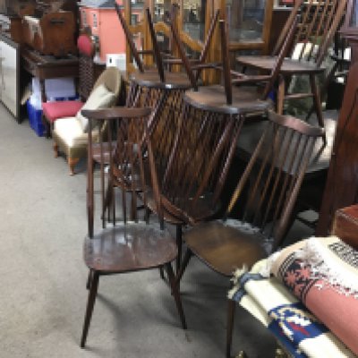 Ten Ercol dark wood chairs , 96cm tall.