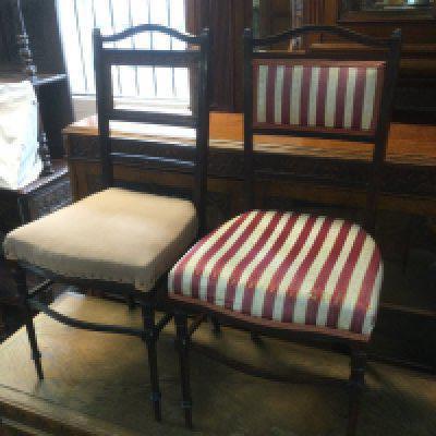 A pair of Edwardian upholstered occasional chairs. Shipping category D.