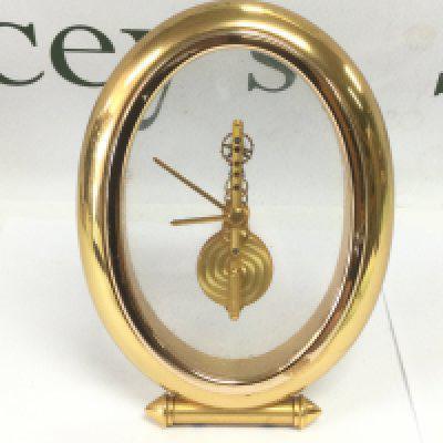 A Jaeger Le Coultre brass cased clock, approx height 16cm. Shipping category D.
