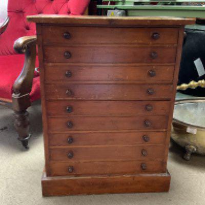 A small 9 drawer collectors chest, each draw with a glazed cover. 63cm x 29cm x 49.5cm