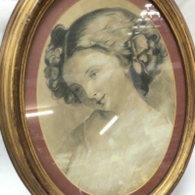 An early 20th century framed chalk and charcoal sketch of a woman . 47cm tall 37cm wide. This lot cannot be posted. NO RESERVE