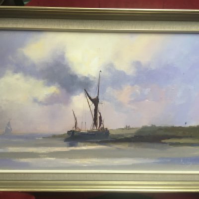 A framed Vic Ellis oil on board painting with a marine scene of sailing barge. 69x43cm