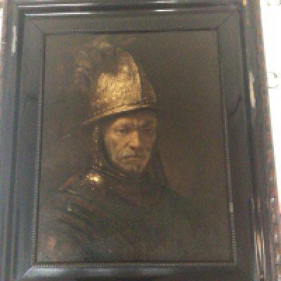 A framed painting on board. After the original by Rembrant Man in a Golden Helmet in an early 17th century style frame. 58x68cm