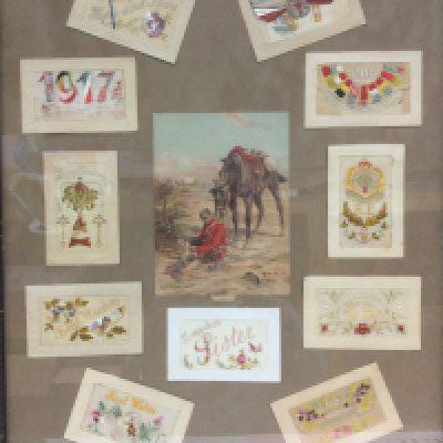 A framed and glazed collection of WW1 silk postcards. Shipping category D. NO RESERVE