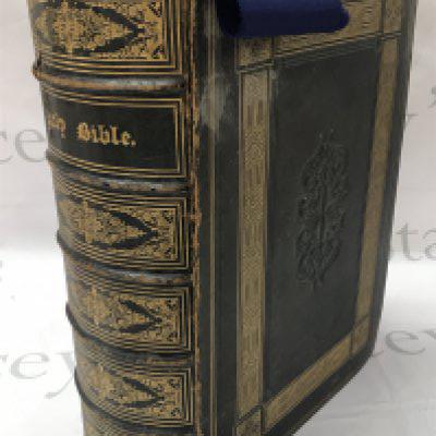 A large Victorian leather bound bible, The Family Devotional Bible by the Revered Matthew Henry . Postage category C NO RESERVE