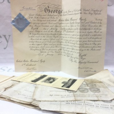 A collection of 1870s/1880s merchant marine discharge certificates (14) with a WW1 military commission signed by King George V. Postage category B