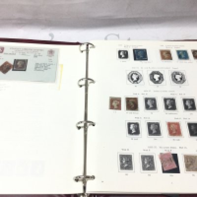 A collection of 7 stamp albums including pre decimal and a penny black. Postage B