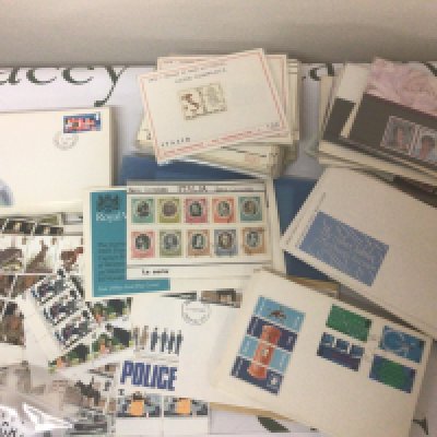 A collection of first day covers from the 1960s onwards Italian stamps British unused pictorial stamps presentation packs and others