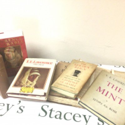 An intresting collection of books by T.E Lawrence and other authors including The Seven Pillars of Wisdom a scrap book with numerous press cuttings TE Lawrence The Mint The golden Reign and many other closely associated vintage books.