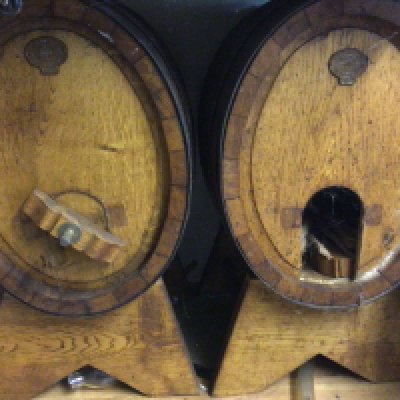 Two Vintage 50L oak wine caskets on stands (2)