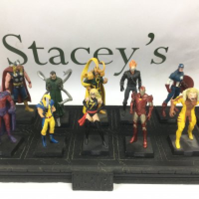 A collection of approx 60 Marvel action figures with display stands. Shipping category D.