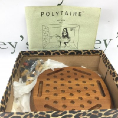 A Polytaire board game by Piet Hein. Shipping category B.