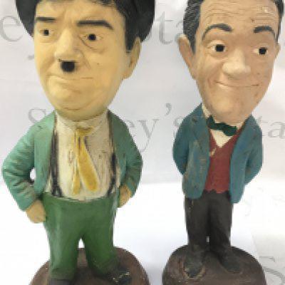 Laureen and hardy plaster figures , tallest 44cm. this lot cannot be posted