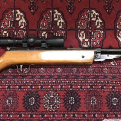 Vintage air rifle with a BSA .22 Scope, 103cm long. Mechanism seen functioning. This lot cannot be posted