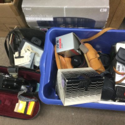 A collection of cameras and video cameras. Shipping category D.