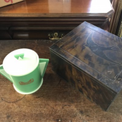 A blue bird tin and an art deco plastic jar. Postage category C