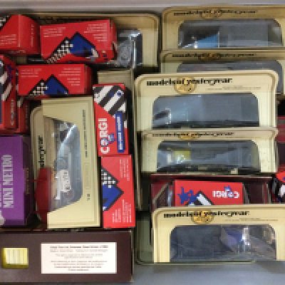 Four boxes of model cars including models of yesteryear various
