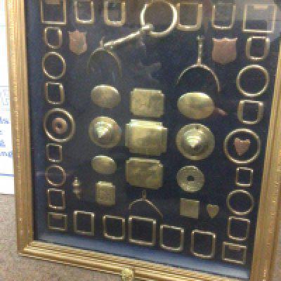 A case of brass horse harness fittings , large buckles etc. this lot cannot be posted