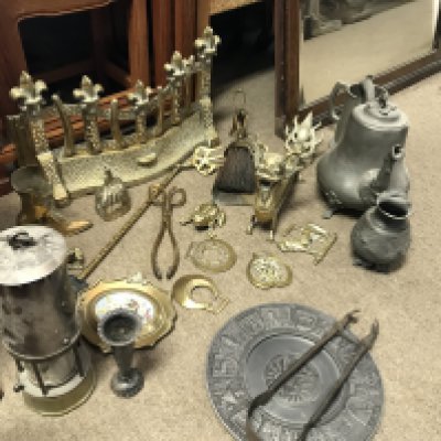 A miners Lamp and brassware including a dragon figure, fireplace grate etc