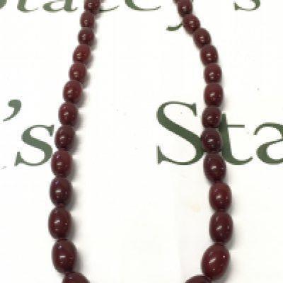 Cherry amber bakelite necklace, 84cm long . 135g total weight. Postage category A