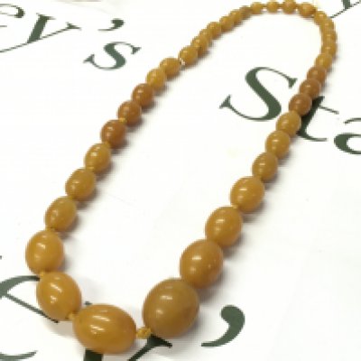 Butterscotch bakelite amber necklace , 74cm and 100g total weight postage category A