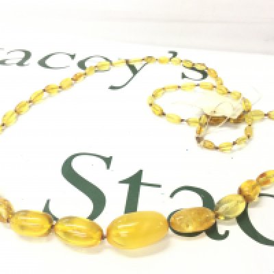 A Baltic amber necklace, 112cm 45g