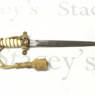 A WW2 Third Reich Kriegsmarine dagger by Alcoso with battle ship engraving on blade and gold sword knot. No scabbard. Blade 24cm long, 37cm long. This lot cannot be posted