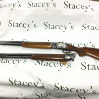 A 12 gauge over and under shotgun with walnut stock. Double trigger with ejector and fixed choke. Comes with spare barrel. BRNO model ZH303. Serial number 317773. PLEASE NOTE THAT A SHOTGUN LICENSE IS REQUIRED TO PURCHASE THIS ITEM. COLLECTION AND VIEWING BY APPOINTMENT ONLY.