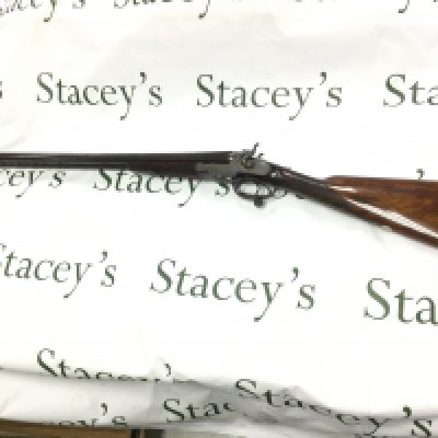 A fine example of a 12 gauge side by side hammer shotgun by George Gibbs. Features nice detailed scroll engraving to side and a walnut stock. 28inch barrel and 44.5 inches overall. Serial number 6261. PLEASE NOTE THAT A SHOTGUN LICENSE IS REQUIRED TO PURCHASE THIS ITEM. COLLECTION AND VIEWING BY APPOINTMENT ONLY.
