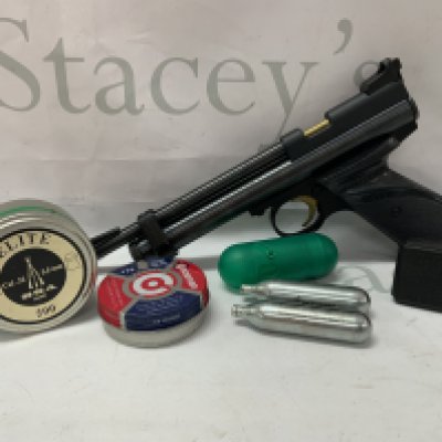 Crosman 2240 CO2 Bolt Action Air Pistol (.22 caliber) Together with additional items.