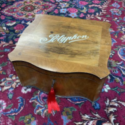 A 19th Century walnut cased Polyphone music box with 10 additional discs. (D)