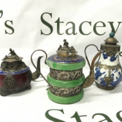 Three Chinese metal mounted tea pots. 9 to 12cm tall. With four character marks to base. This lot cannot be posted
