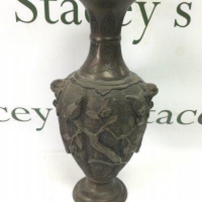 A Japanese bronzed vase decorated with applied birds amongst foliage, approx height 33cm. Shipping category C.
