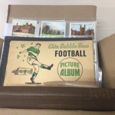 A box containing Vintage cigarette cards including Chix Bubble Gum cards and an album and many other cards many well presented in plastic sleeves.