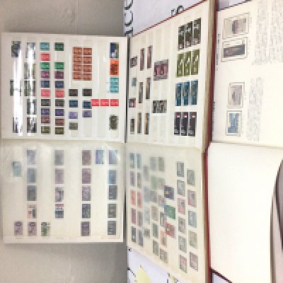 Five albums of stamps and other loose stamps including a presentation album of Japanese stamps other world stamps a collection of Elizabeth II stamps including unused pre-decimal Commonwealth and British colonial stamps.