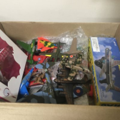 A collection of model aircraft and commercial helicopter models.