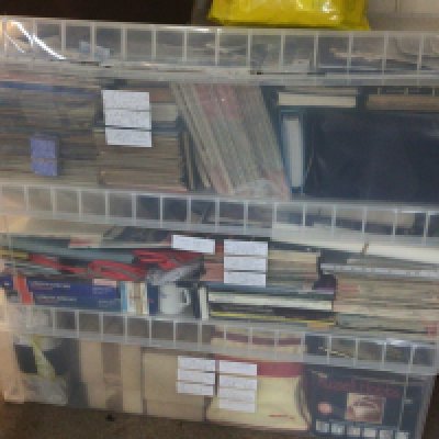 Three boxes containing Aviation memorabilia Vintage airbags magazines and others.